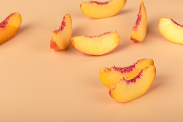 Naklejka na ściany i meble Ripe peach fruit slice