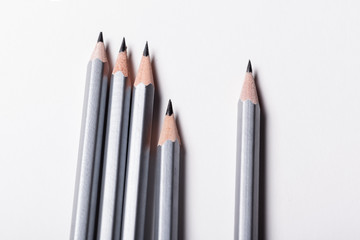 Pencil isolated close up on white background top view