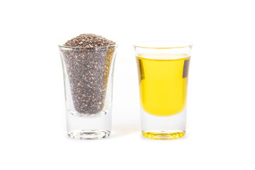 Chia seeds and chia oil on white background.Organic chia seed oil.Healthy food,superfood. Healthcare concept.