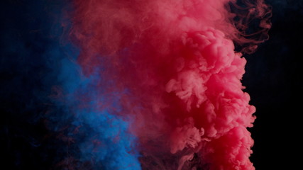 pink and blue bomb smoke on black background