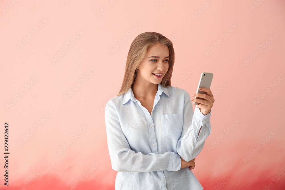 Sticker young woman with mobile phone on color background