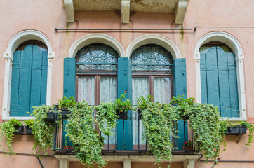 Fototapeta na wymiar The best windows in the beautiful city of Venice