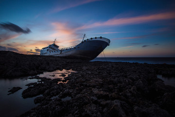 Abandoned shipwreck which ran aground at the coast of Malta.