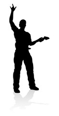 A guitarist musician in detailed silhouette playing his guitar musical instrument.
