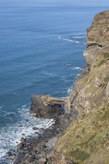 Fototapeta na wymiar Coastal landscape scenery showing a rock arch on the west Cornwall coast