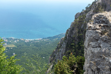 Fototapeta na wymiar Cliff over the forest and the sea, Ai-Petri, Crimea