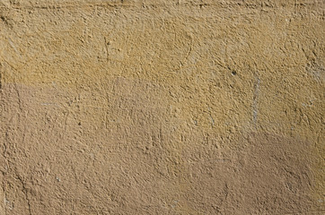 Old concrete wall with cracks and chipped