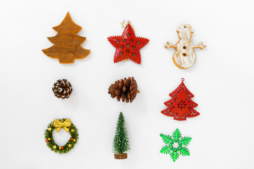 Christmas Background with decorations on white paper. Creative flat lay, top view design