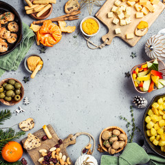 Fototapeta na wymiar Festive flat lay with christmas dinner party table, holiday vegeterian food concept background, top view with copy space.