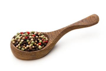 Pepper mix seed on spoon on white background.