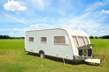 caravan or camper car with blue sky