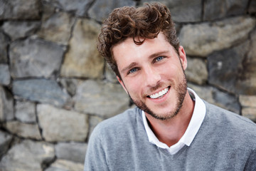 Happy dude in grey sweater, portrait
