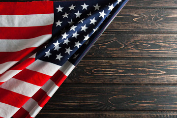 American flag close up on wood desk