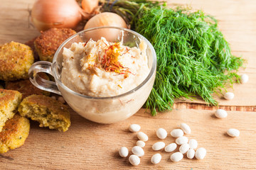 fresh falafel balls served with salad and hummus.