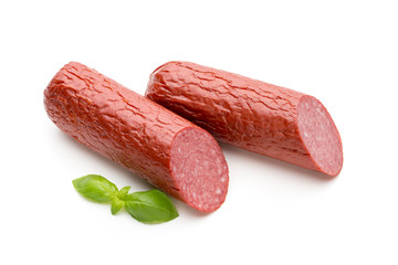 Salami smoked sausage, basil leaves on white background cutout.