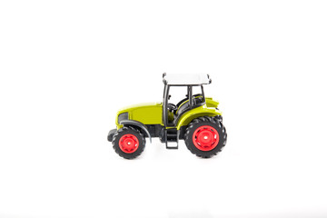 Toy tractor isolated on white