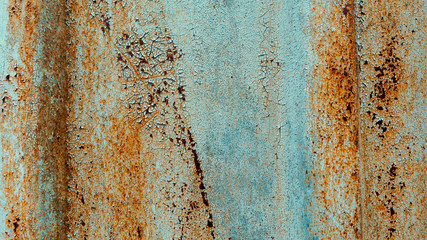 Rusty texture on a metal container that is on the street all year round.