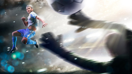 Soccer players in action on the grand stadium background panorama