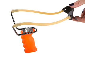 slingshot or catapult on white background, female hand pulls on concept of acceleration, isolate