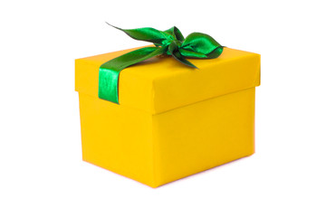 Yellow gift box with green satin ribbon bow