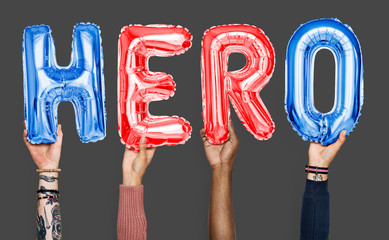 Hands showing hero balloons word