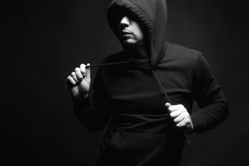 Man in Hood. Boy in a hooded sweatshirt