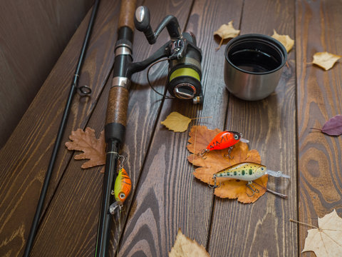 Fishing equipment on wood table