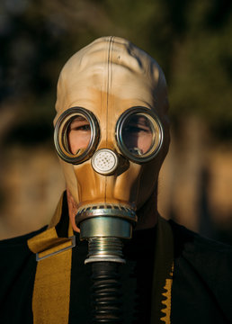 Man with tear gas mask