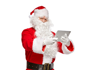 Santa Claus using tablet computer.