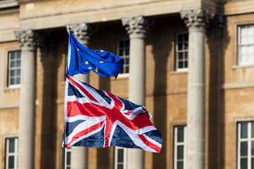 European union and British Union jack flags flying together. Brexit concept