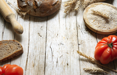 Rustic food background with fresh homemade bread