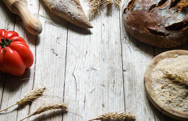 Rustic food background with fresh homemade bread