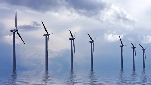 Windmills at a lake in the countryside from the Netherlands