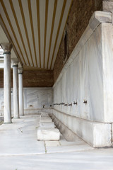 Ablution taps at a mosque in Istanbul where worshippers wash their feet. Aya Sofia Istanbul