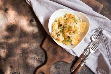 Cauliflower casserole with cheese in a cream sauce. Cauliflower gratin with bechamel sauce