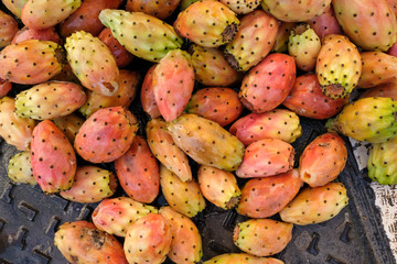 Prickly pear cactus fruit on a street in Trani, Puglia, Italy. They have just been washed by a...
