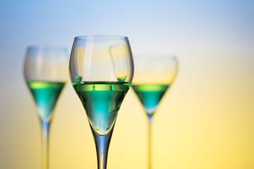 three glasses with cocktails