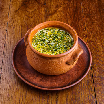 Mushroom soup in a pot on a table