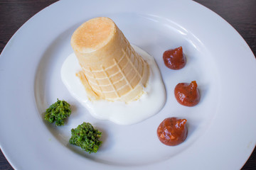 inverted waffle ice cream in a white plate, lots of sugar, obesity, diabetes