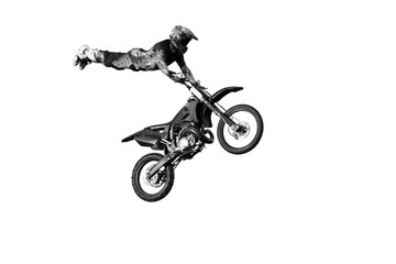 Freestyle motocross biker performs the trick in jump at fmx competitions isolated on white background