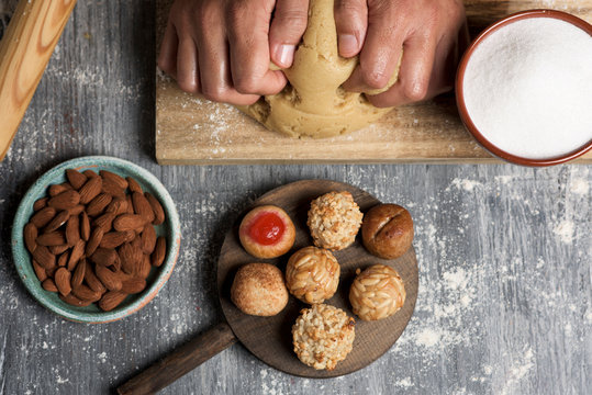 man preparing panellets, typical of Catalonia