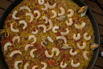 Tipical spanish paella on a paella pan
