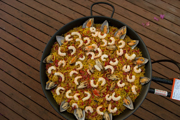 Tipical spanish paella on a paella pan