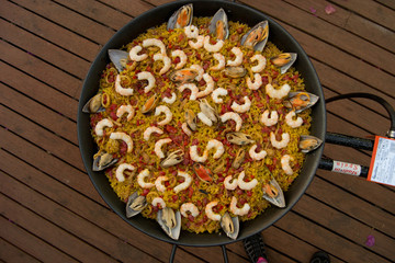Tipical spanish paella on a paella pan