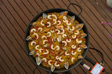 Tipical spanish paella on a paella pan