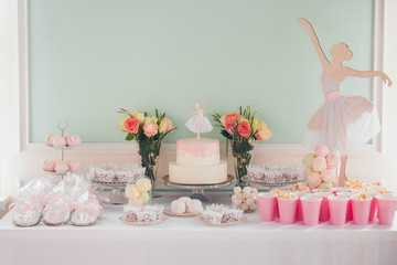 Ballerina Candy Bar. Delicious sweet buffet with cake. A beautiful buttercream layer cake decorated with ballerina cake topper.