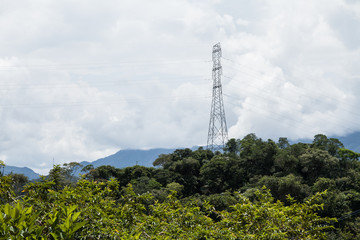 high-voltage electric tower, in a natural environment