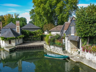 Naklejka premium picturesque old houses on the canal in the Loire, France