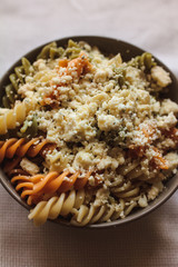Tri color fusilli with cheese with dill