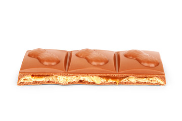 Chocolate bar with peanuts on a white background